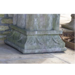 stone pedestal with stone urn