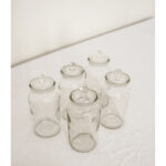 Set of Five English Lidded Glass Apothecary Jars