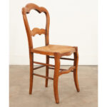 English 19th century fruitwood chair with a rush seat