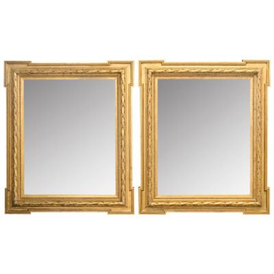 Pair of French Carved Gold Gilt Mirrors