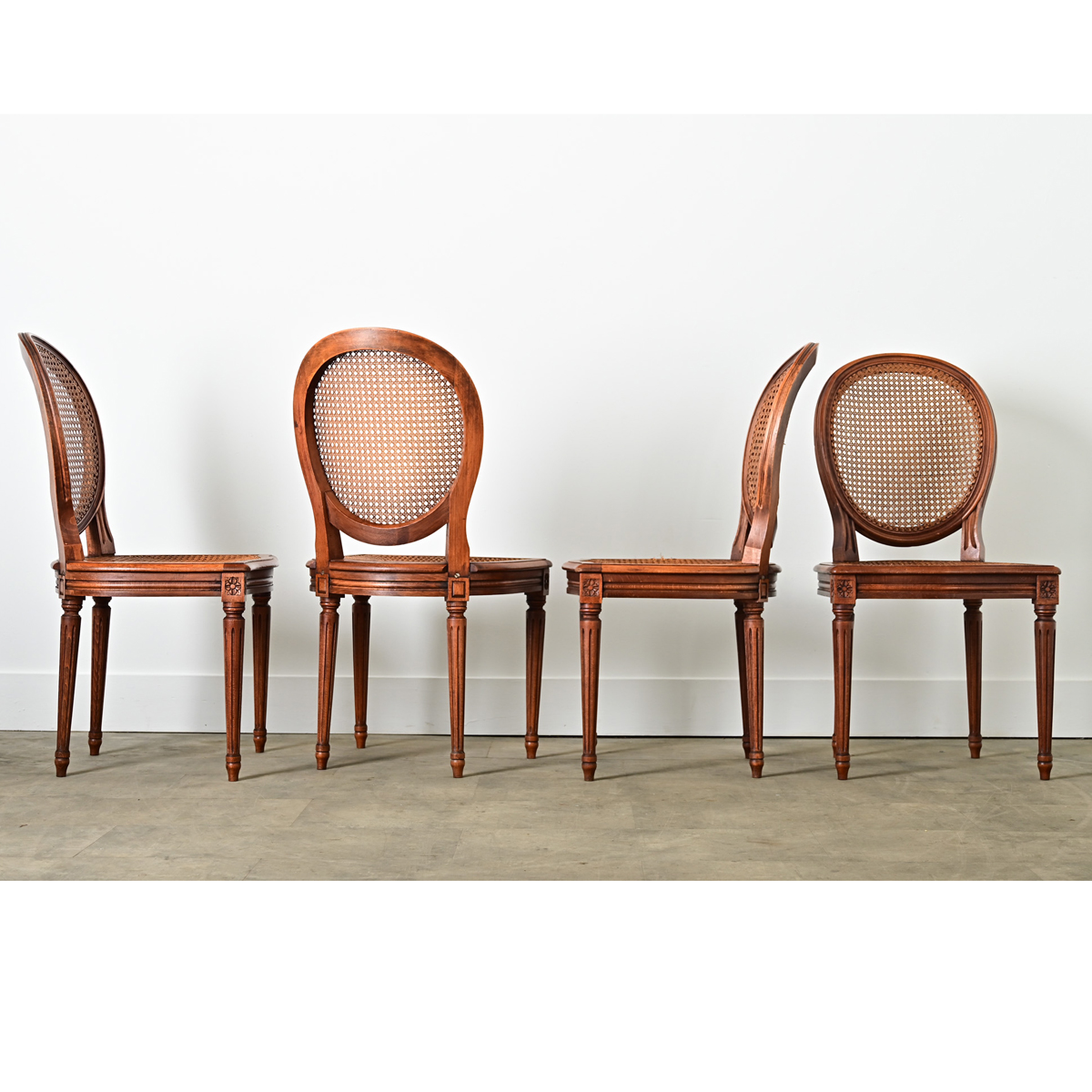 French Set of Four Louis XVI Style Cane Dining Chairs - Fireside