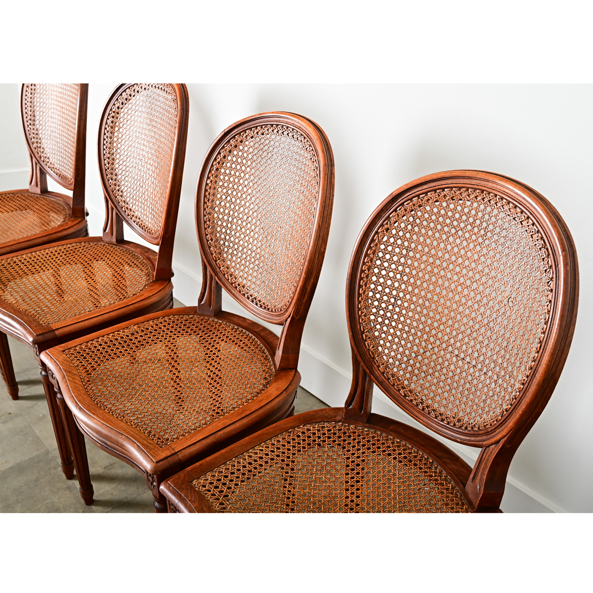 French Set of Four Louis XVI Style Cane Dining Chairs - Fireside